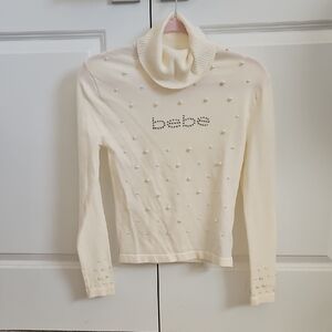 Bebe Pearl-Embellished Cream Turtleneck Sweater